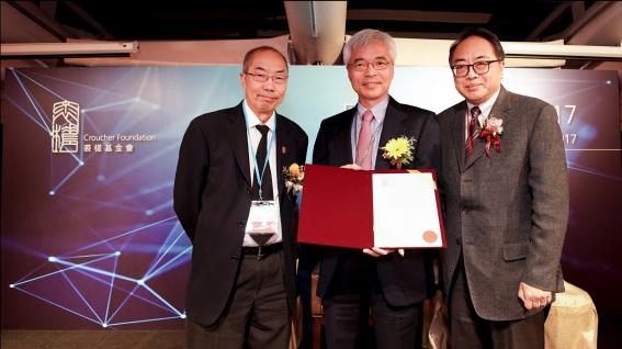  Prof Zhang receives Croucher Senior Research Fellowships 2018-2019 at the award ceremony from Prof Mak Tak-Wah (left), Chairman of Board of Trustees of the Croucher Foundation and Prof Lap-Chee Tsui, President of the Academy of Sciences of Hong Kong (right) Photo credit: Croucher Foundation